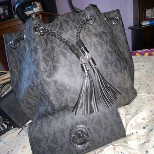 Michael Kors purse and matching wallet.